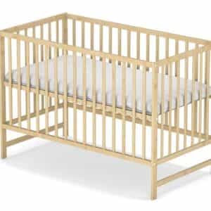 Łóżeczko Klasyczne w kolorze drewna sosnowego.